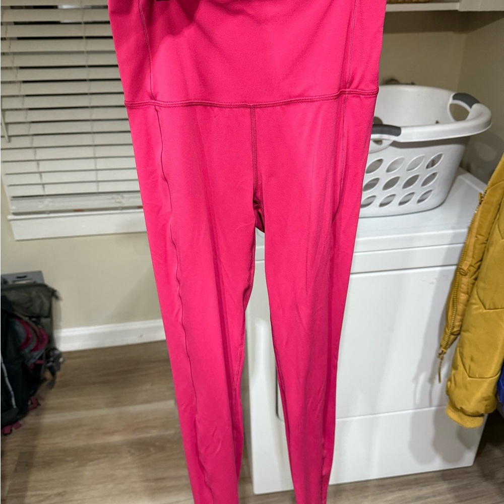 Left on Friday pink leggings